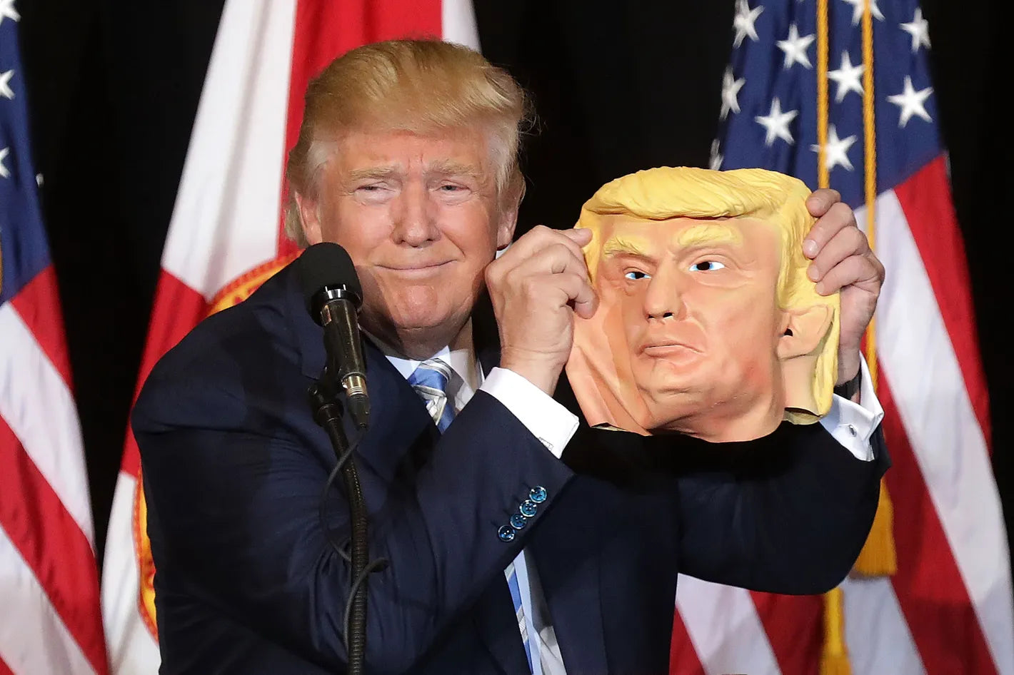 Donald Trump Holding Mask Glossy Poster Picture Photo Print Banner  Booma Prints