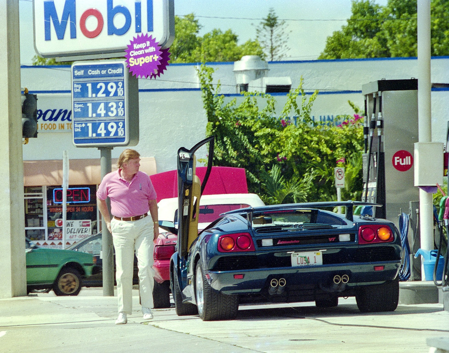Donald Trump Pumping Gas Glossy Poster Picture Photo Print Banner  Booma Prints